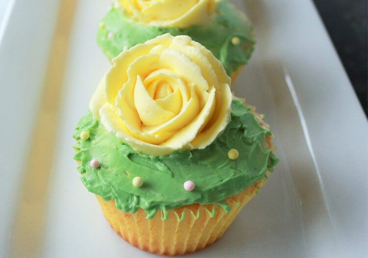 lemon cupcakes with floral decoration