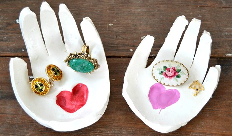 clay jewelry holder in the shape of a hand