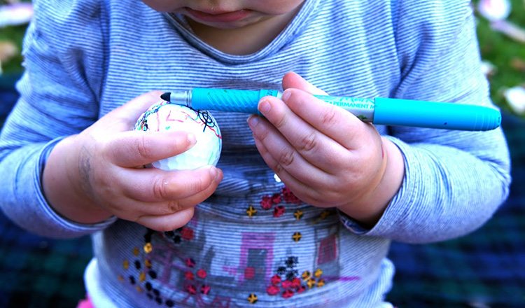 golf balls decorated with marker and pen