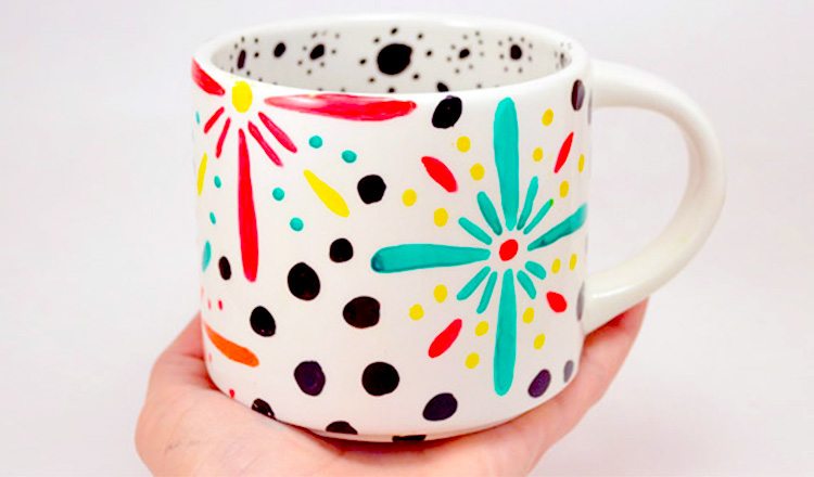 mugs painted in floral patterns