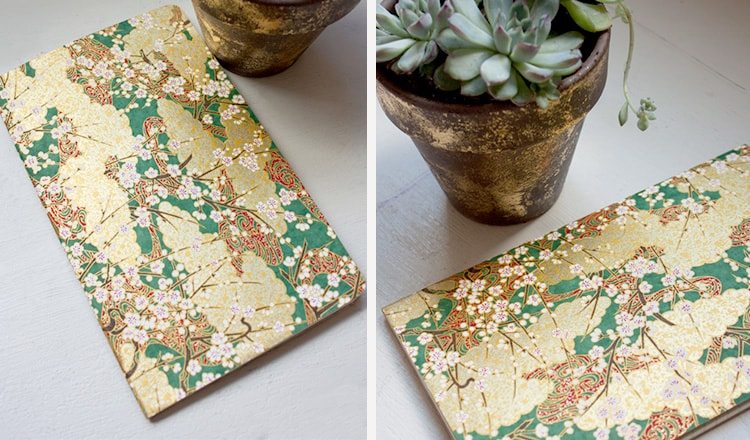 notebook covered in origami paper